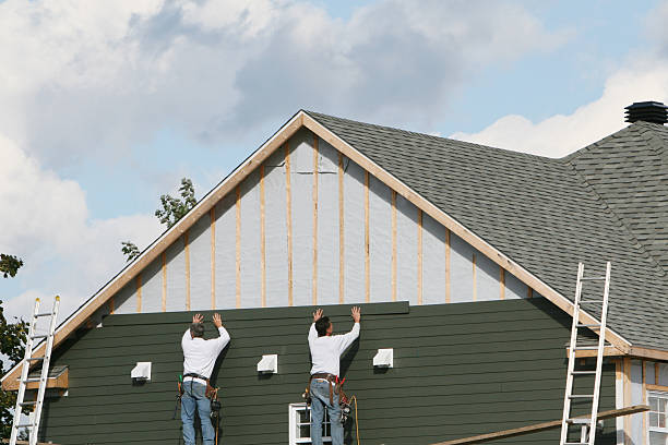Professional Emergency Siding Repair technician working in Haw River, NC